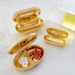 brass_pill_box_ambien_a_da98e0b8-3029-4f34-a2db-8d9368eb04b4