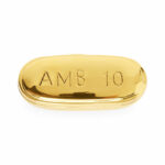 brass_pill_box_ambien_a_da98e0b8-3029-4f34-a2db-8d9368eb04b4